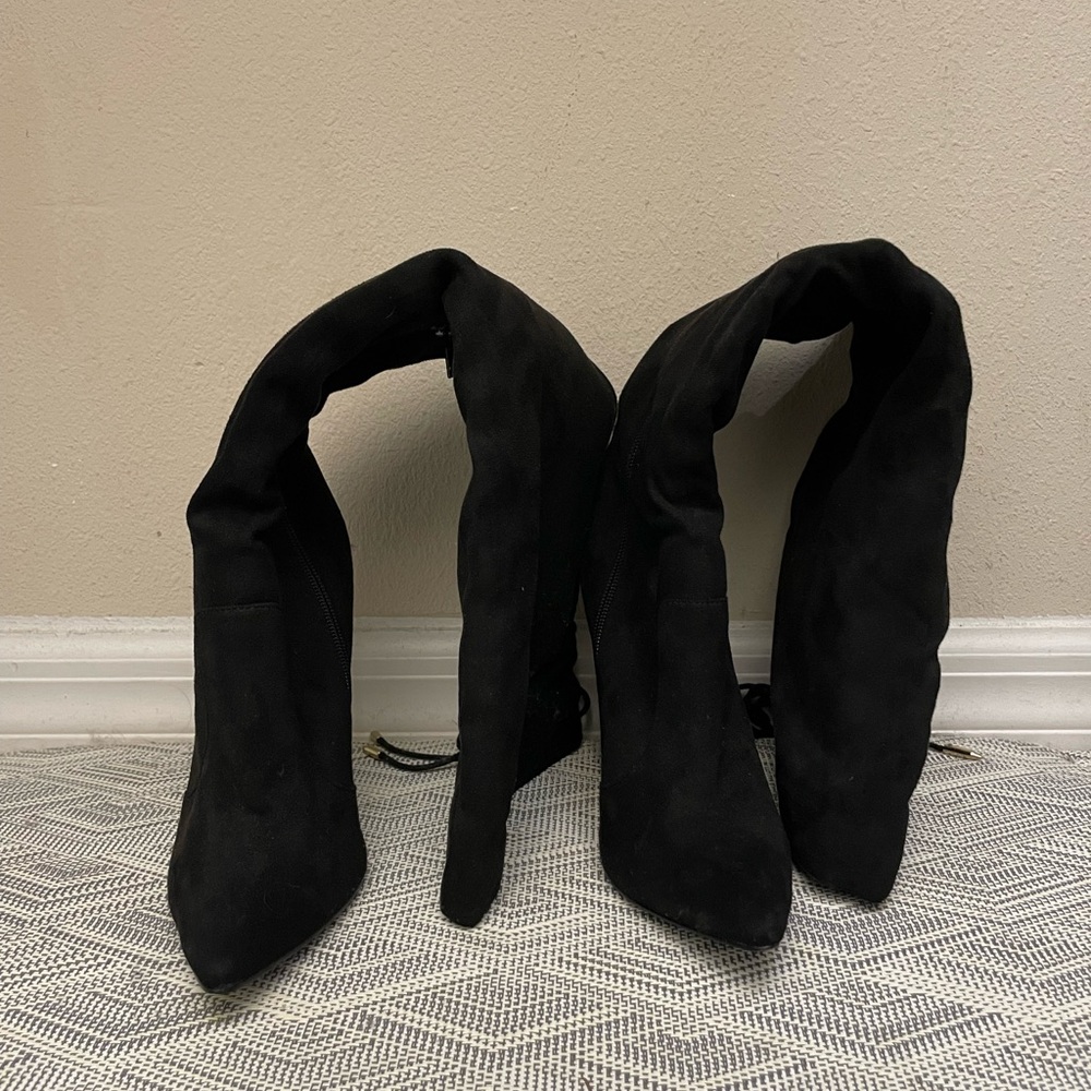 Black knee highs with clear chunky heel.